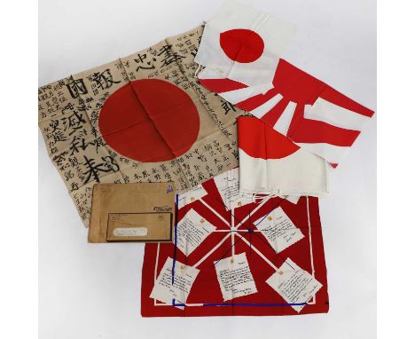 A Japanese Second World War kamikazi flag,  a Japanese kamikazi pilot's flag, with a plain red sun surrounded by calligraphy,