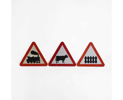 A group of vintage street signs, mid-20th century and later, a group of three metal street signs, warning of cows, a level cr