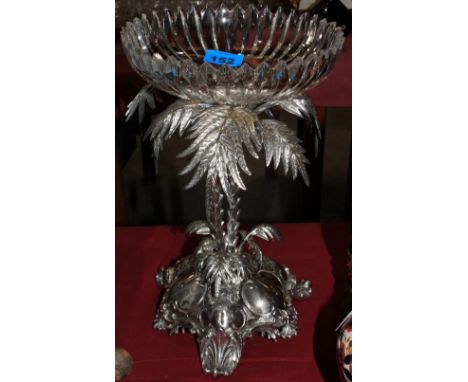 A silver plated centrepiece by Thomas Bradbury and Sons, the cut bowl supported by two entwined palm trees on a shaped shell 