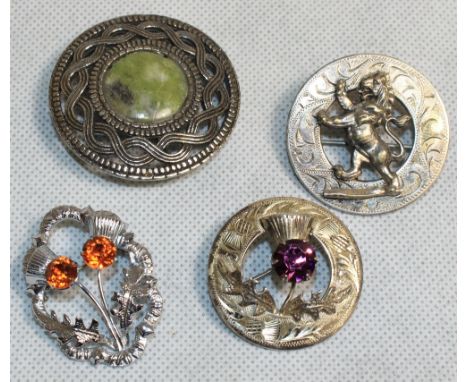 Four Scotch silver brooches