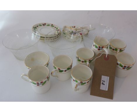 A part porcelain tea service together with 3 glass bowls.