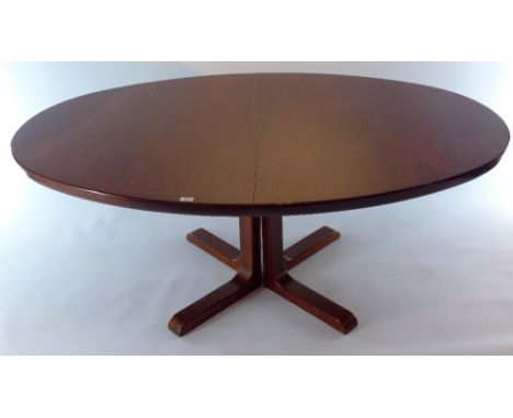 A Danish rosewood dining table designed by Skovby and marked underneath. L 180 x H 73 x D 121cm 