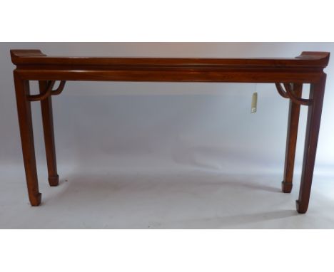 A Chinese elm altar table raised on square tapered legs and spade feet, H 85 x W 152 x D 33cm 