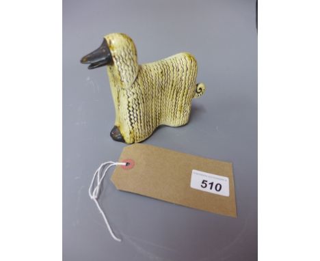 A ceramic model of an Afghan hound, H 12 x W 13 x D 4cm 