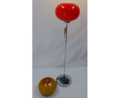 A vintage chromed standard lamp having a red glass shade together with an additional spare shade, H 120 x Diameter 28cm 