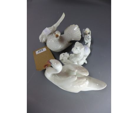 Five Royal Copenhagen porcelain animals to include a swan, a squirrel, a robin, a dove and a group of two dogs playing. each 