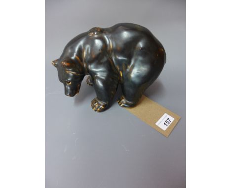 A Royal Copenhagen ceramic model of a grizzly bear. stamped with three wavey lines and makers initial 'K K'. H-16cm W-22cm D-