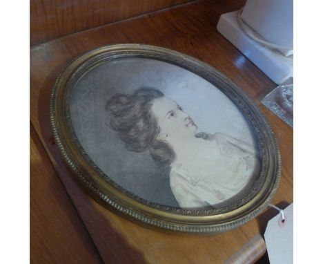 An oval 19th century watercolour depicting a portrait of a lady, H 29 x W 24cm 