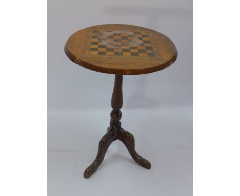 A 20th century circular games table raised on tripod legs, H 67 x  Diameter 48cm 