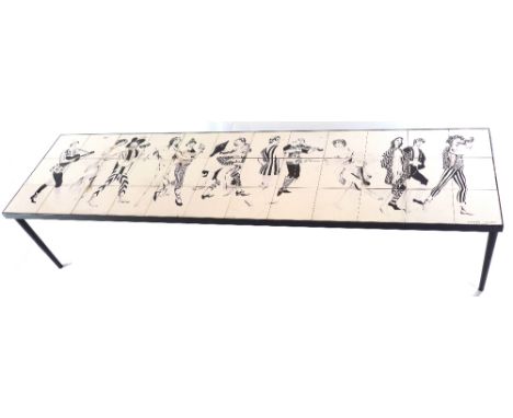 A tile top 1960's table, decorated with dancing figures 40 x 183 x 46cm 