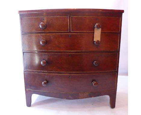 A Victorian mahogany bowfronted chest of two short and three long graduated drawers and raised on bracket feet, H 103 x W 102