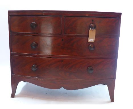 A Victorian mahogany bow fronted chest of two short above two long drawers and raised on splayed bracket feet, H 85 x W 102 x