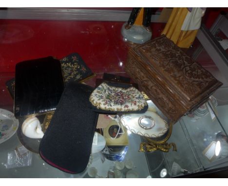 A collection of items including a carved wood Indian box, a shell snuff box, a shell spoon, a combined cigarette case and lig