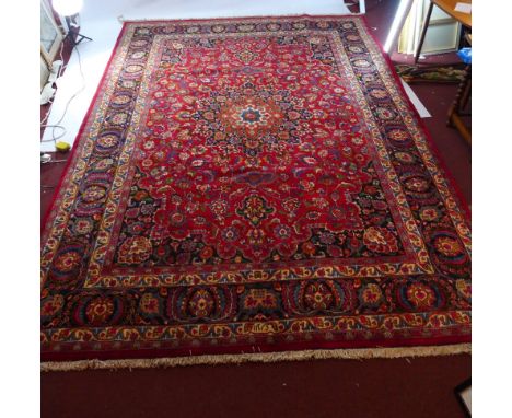 A fine north east Persian Meshad carpet 340 x 257cm, the central double pendent medallion signed with repeating spandrels on 