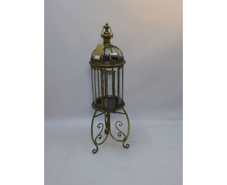 A classical style brass storm lantern on stand. H-108cm