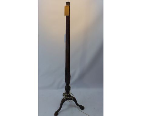 A 19th century mahogany torchere with reeded stem and raised on tripod legs and ball and claw feet,  173cm 