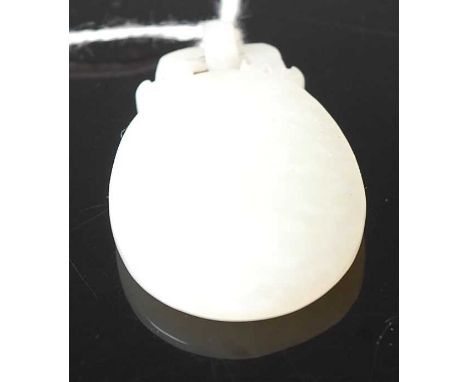 A Chinese pale celadon jade pendant, 41mm (excluding bale), 17.4g