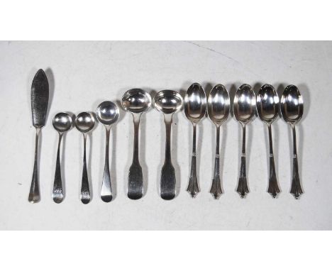 A small collection of 19th century and later silver flatware, to include mustard spoons, teaspoons, butter knife etc, gross w