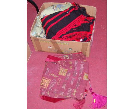 A box of miscellaneous textiles, to include large floral embroidered panel, curtain ties etcCondition report: The red and bla