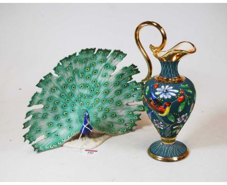A large Goebel German model of a peacock, printed mark verso and impressed 1979, h.23cm; together with a continental ewer, en