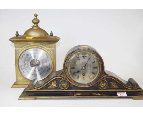 An early 20th century black lacquered and chinoiserie decorated mantel clock, having a silvered dial with Roman numerals, fai