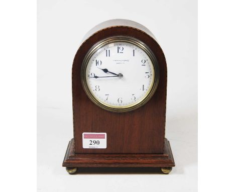 An Edwardian mahogany cased dome-top mantel clock, having a convex enamelled dial with Arabic numerals, signed Mappin &amp; W
