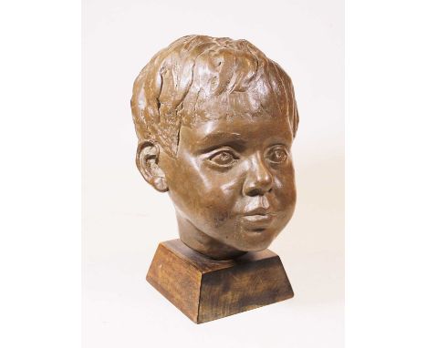 A 20th century bronzed portrait bust of a boy, mounted on a wooden plinth, h.26cmCondition report: No apparent faults but is 