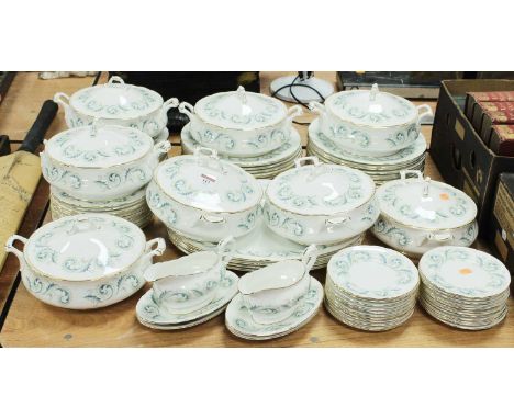 An extensive Royal Stafford fine bone china dinner service in the Garland pattern to include tureens and covers, meat plates,