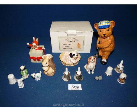 A small quantity of china figures to include a Beswick King Charles Spaniel, a Royal Doulton Disney figure of 'Patch in Baske