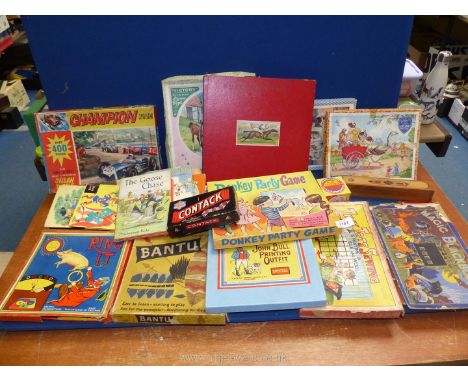 A quantity of vintage toys, Victory jigsaws and children's books including Glevum Ring It, The Magic Blackboard and Donkey Ch