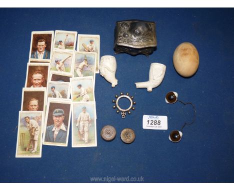 A silver Masonic jewel mount R.A.O.B, Irish clay pipe head, Japanese trinket box, stone egg etc.