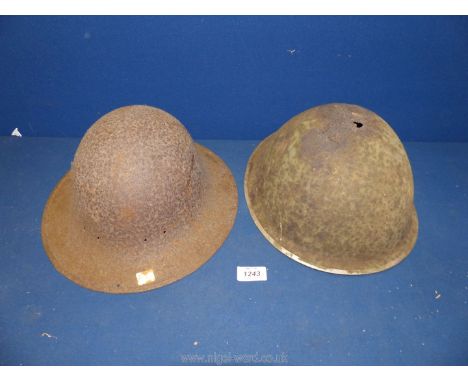 A pair of Army helmets.