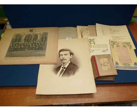 An old Victorian album of sepia portrait photographs of ladies and gentlemen, and a wallet of hand written poems with coloure