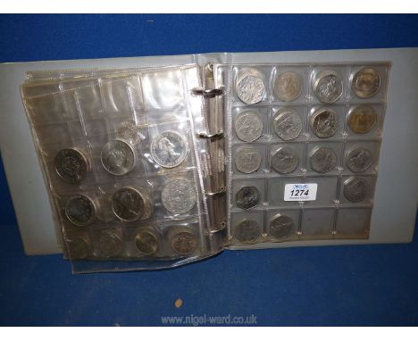 A coin folder including sixpences, 10p pieces, 50p pieces, six crowns including Churchill, Charles and Diana, Queens Silver W