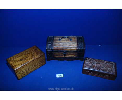 A 20th c. rectangular Oak Box with padded silk interior, 7 1/2'' long, Bamboo domed box with bracket feet and metal mounts, 9