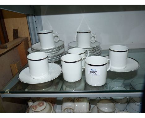 A Thomas of Germany part Teaset, white with silver rims, seven cups and tea plates and eight saucers.