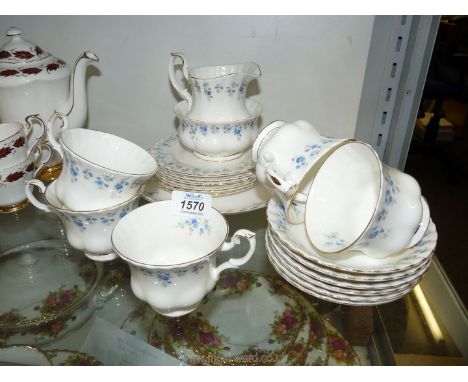 A Royal Albert Memory Lane Teaset including five cups and saucers, six side plates, milk jug, sugar bowl and a cake plate.