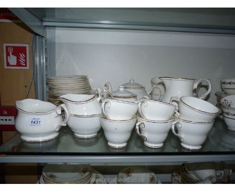 An Ascot Duchess porcelain part tea service in white with silver border to include; two teapots, six cups, four mugs, etc.