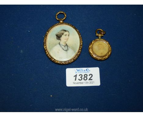 A large gold coloured pendant with portrait of a lady 'Joslyn', together with a smaller pendant/double locket of lady and chi