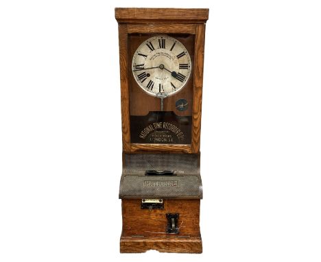A National Time Recorder Co. Ltd Timeclock, early 20th century,   with oak case, circular enamel dial and National patent car