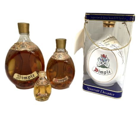 WHISKY: Four assorted Dimple Scotch Whisky Bottles, including a ‘Souvenir Decanter’  Commonwealth Games 1986 Dimple, 43% Vol.