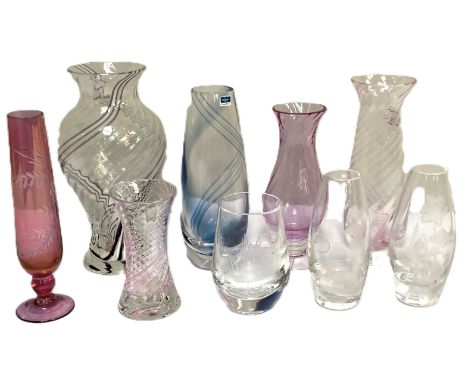 CAITHNESS GLASS: Nine assorted glass vases, including a ribbed and waisted clear art glass vase, decorated with white/black s