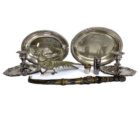 A group of silver plate, including a pair of Victorian night sticks, with moulded drip pans and removable snuffers; also an o
