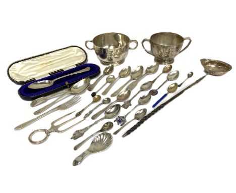 An assortement of silver flatware, including a toddy ladle with baleen handle,  also a cased ‘Christening’ spoon, a scalloped