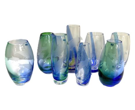 CAITHNESS GLASS: A group of eight art glass vases, with green and blue coloration, including six etched with dolphins,   also