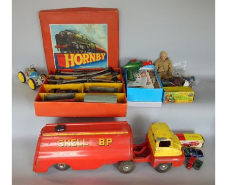 A mixed toys and gaming lot to include Action Man, Hornby passenger set, large Triang lorry and others, boxed Corgi, The Gree