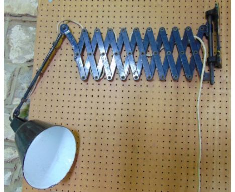 A Walliegraph concertina industrial wall light with enamel shade