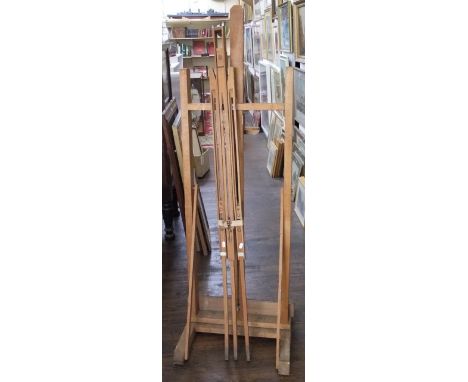 A floor standing artist adjustable easel together with a further portable easel by Winsor & Newton Ltd