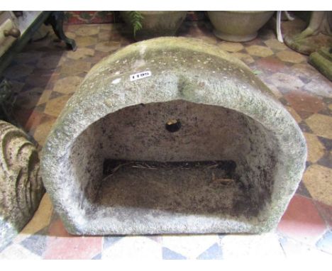 A small weathered cast composition stone D shaped trough approx 54 cm wide x 45 cm deep x 25 cm high