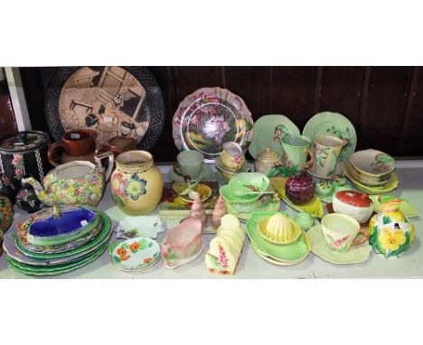 An extensive collection of Carlton wares including a foxglove toast rack, condiments set in the form of shells, boxed and oth